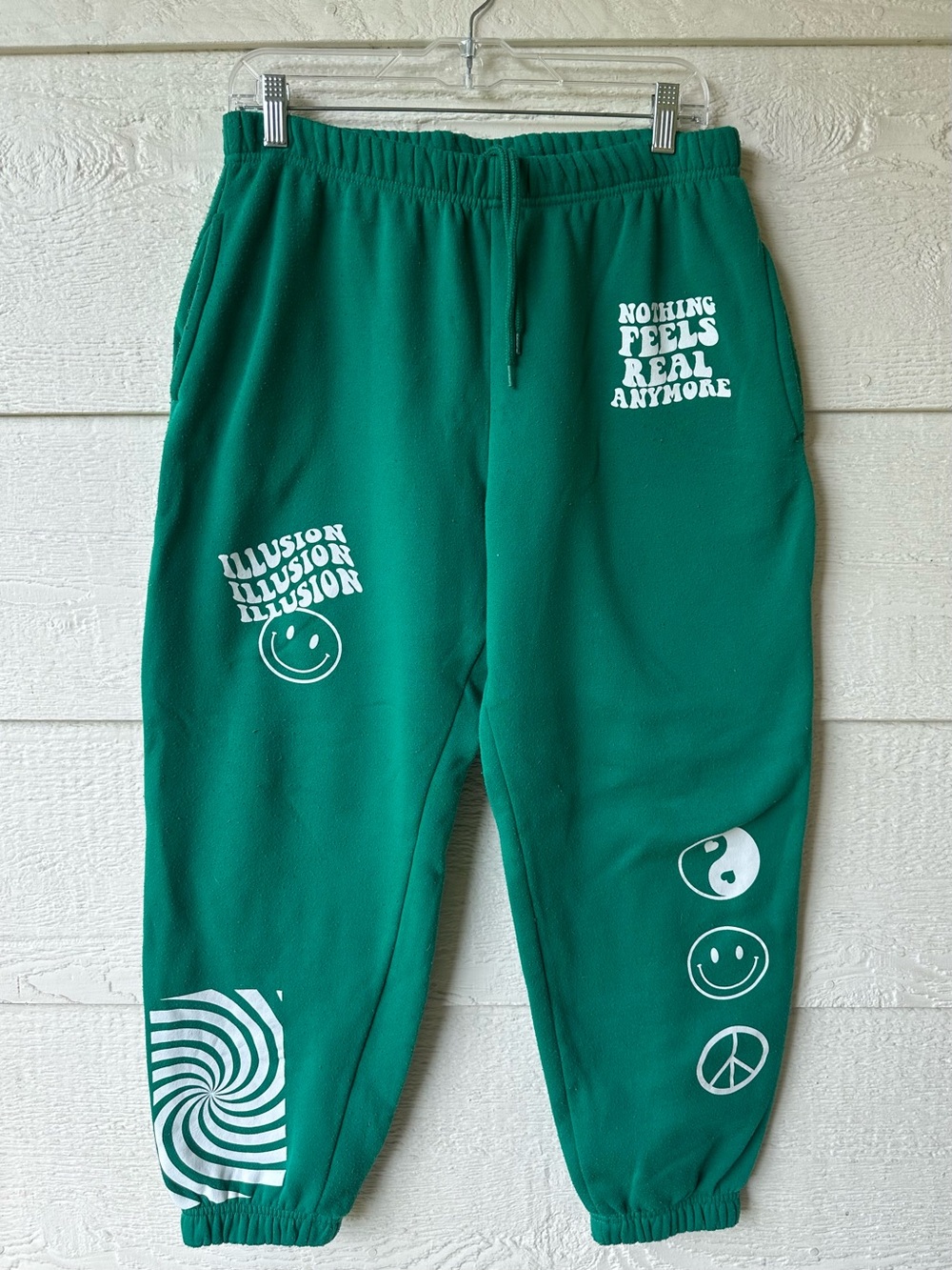 Green graphic sweatpants